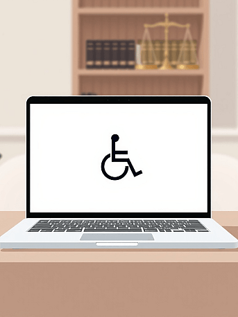 Ein Laptop zeigt ein Symbol für Barrierefreiheit.