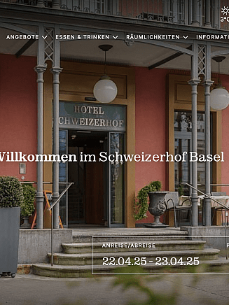 Fassade des Hotel Schweizerhof mit Begrüßungsschild.
